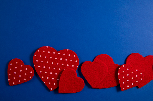 Valentine’s day background with felt hearts