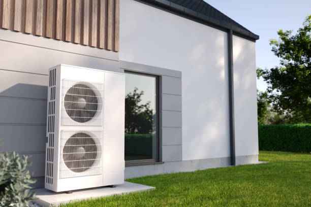 istock Air heat pumps beside house 1937044159