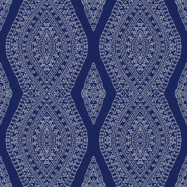 Vector illustration of Seamless pattern, blue and white ikat print from rhombus geometrical ornaments