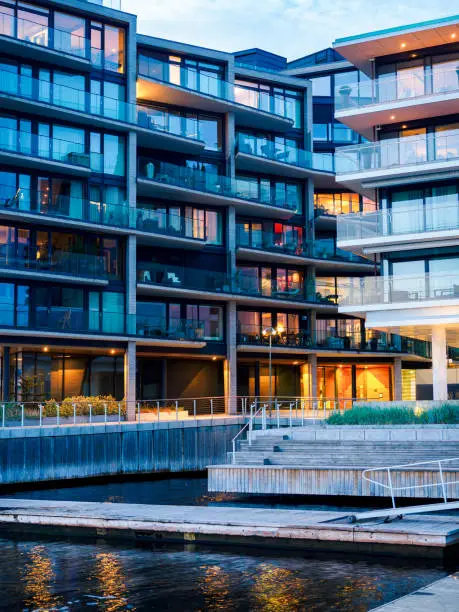 Modern city architecture, new quarter in Oslo - the residential complex of apartment buildings and outdoor facilities in Aker Brygge. Scandinavian residential area