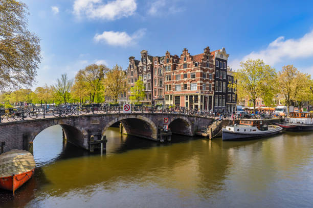istock Amsterdam Netherlands, city skyline at canal waterfront 1937074888