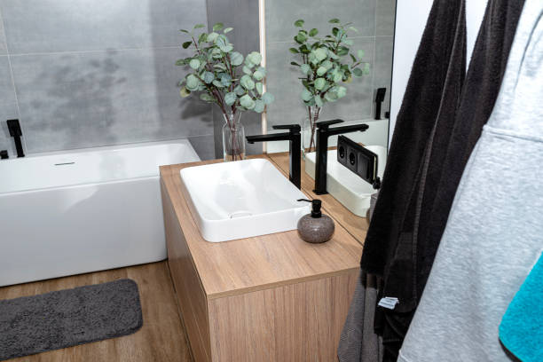 istock LED light strips mounted in the wall in a modern bathroom, visible bathtub. 1937094906