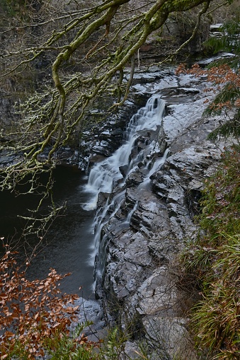 A view of the waterfalls on the river Clyde near New Lanark during winter in Scotland.