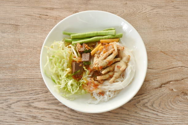 istock rice noodles with spicy chicken curry sauce and fresh vegetable 1937112381