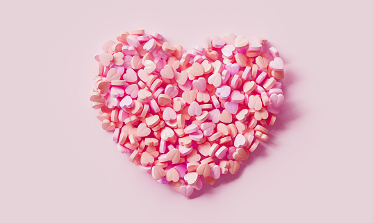 Pink Heart Pills on Pink Background. 3D Rendering