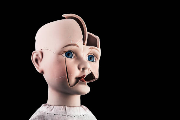 Head  of a vintage doll on a white table