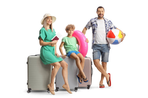 istock Family with suitcases getting ready for a summer holiday 1937143484