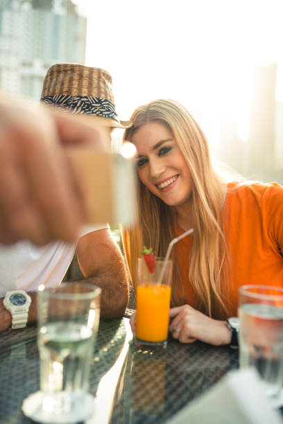 couple take a drink in Dubai Marina