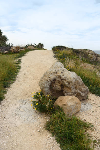 istock Stone on a gravel road. 1937168467