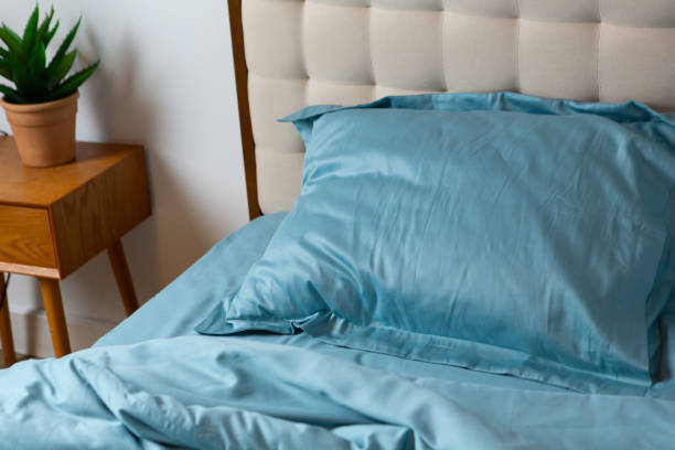 istock Blue pillow on bed morning messy 1937172826