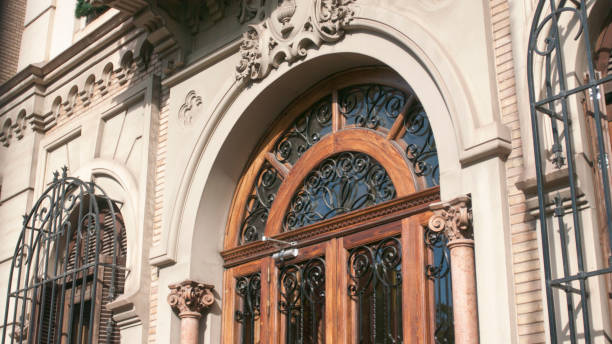 istock Arched door in stone facade 1937187858