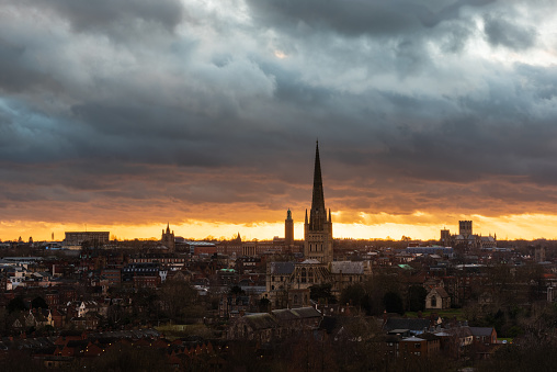 Norwich City sunset skyline shot with cloudy sky. Norwich skyline, Feb 2022