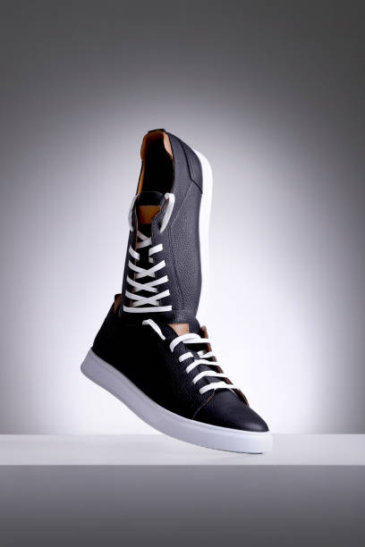 istock dark leather casual sneakers mockup on white background 1937210054