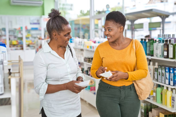 istock Two female customers in pharmacy 1937223715