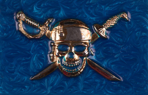 pattern of pirate skull with swords on blue background