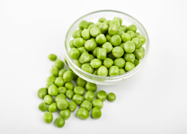 istock Fresh green pea pod with beans isolated on white background. 1937254853