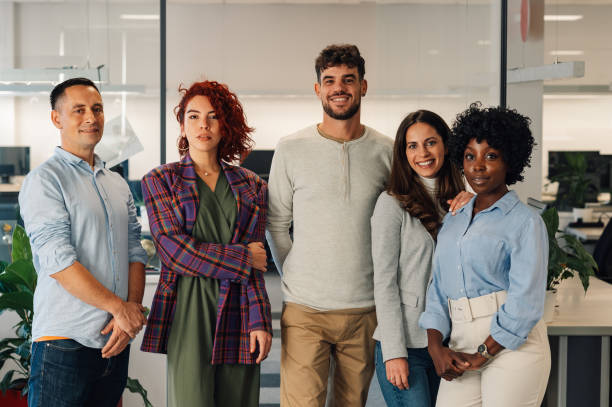 istock Portrait of a dedicated multicultural team posing at office. 1937327369