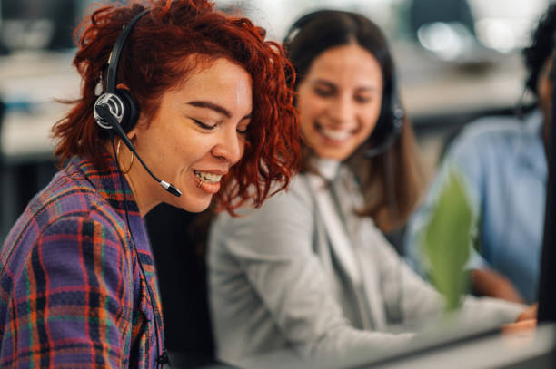 istock Customer services latino woman agent with headset working in an office 1937327374