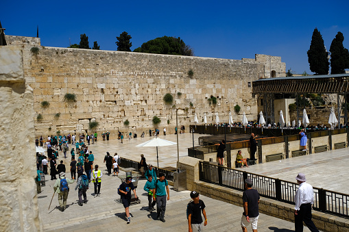 People going to pray at The Wailing Wall\tin Jerusalem