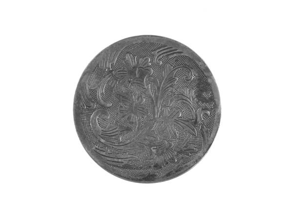 istock metal shield with floral pattern isolated on white background 1937363623