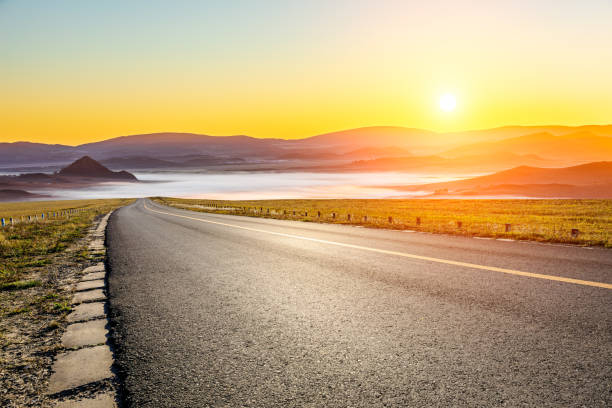 istock Asphalt highway and mountain natural landscape at sunrise 1937378435