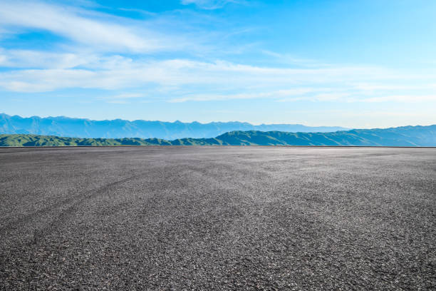 istock Asphalt road square and green mountain nature landscape 1937393520