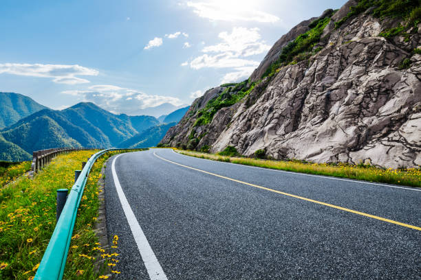istock Asphalt highway and mountain natural landscape under blue sky 1937396280