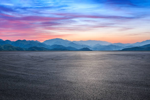 Asphalt road and mountain natural background