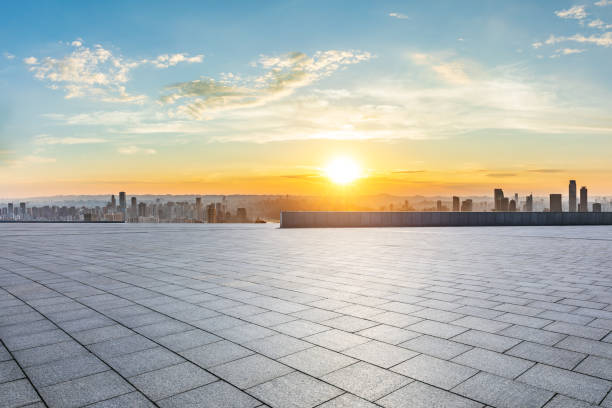 istock Empty square floor and city skyline landscape at sunset 1937412484