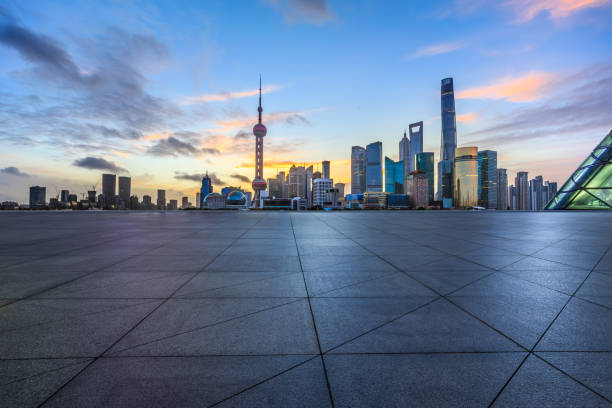 istock Empty square floor and modern city building landscape at sunrise in Shanghai 1937413045