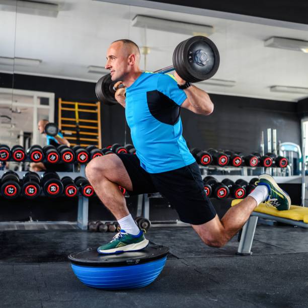 istock Confident man legs workout with the barbell in the gym 1937416911