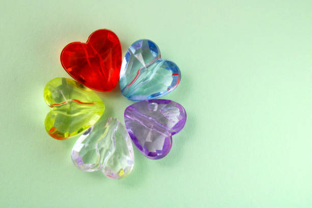 Hearts of different colors with transparency forming a flower