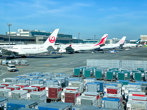 Tokyo Japan - 19 Oct 2023: A lot of aircraft parked at the dock preparing to fly from Narita international airport