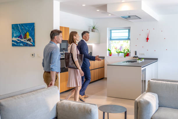 istock Real estate agent showing house 1937435205