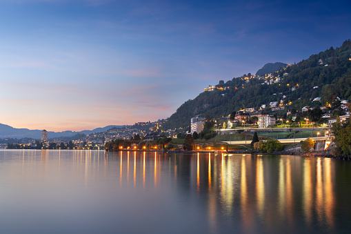 Montreux, Switzerland on Lake Geneva at dusk.