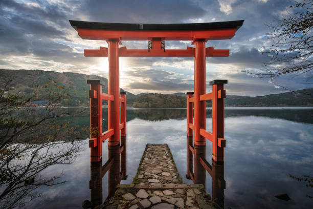 Red Torii Gate on the Shore of Lake Ashi in Hakone, Japan stock photo