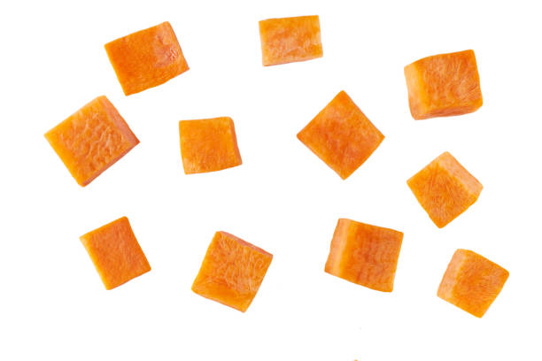 diced carrots isolated on white background.