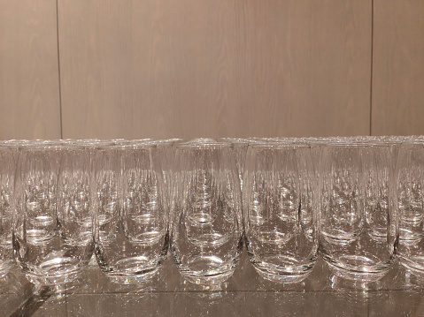 Clean drinking glasses in hotel catering use