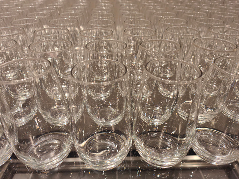 Clean drinking glasses in hotel catering use