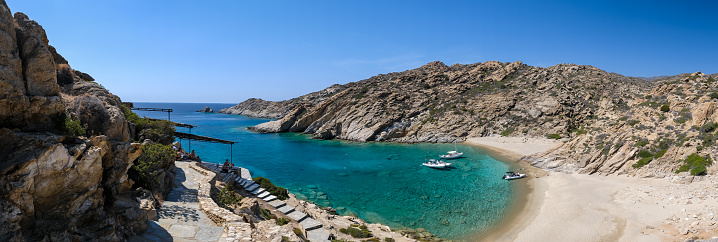 Ios, Greece - September 15, 2023 : Panoramic view of one the most amazing turquoise beaches  of Greece, Tripiti beach on the island of Ios Greece