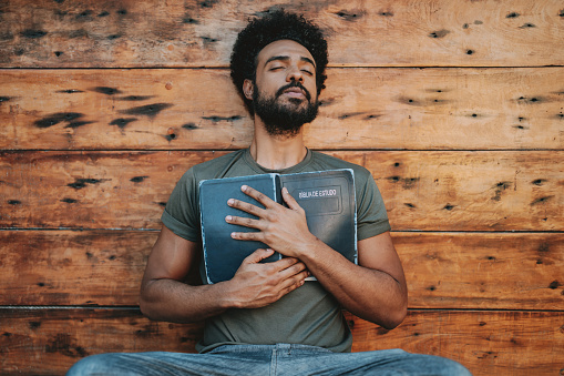 Young man with the bible