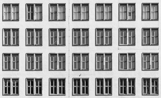 Germany, Berlin, July 17, 2023 - Full frame shot of windows of office building, Berlin Schöneberg