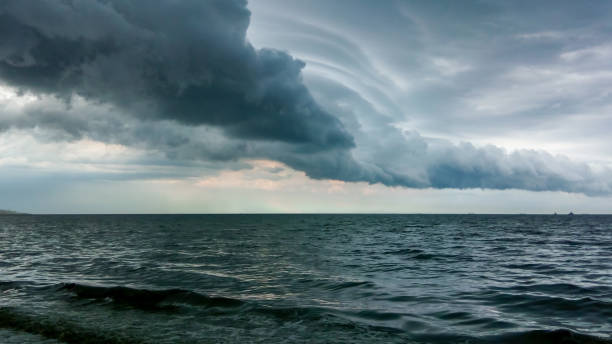 istock Thunderclouds over the Black Sea during blue-green algae blooms (Nodularia spumigena) 1937550028