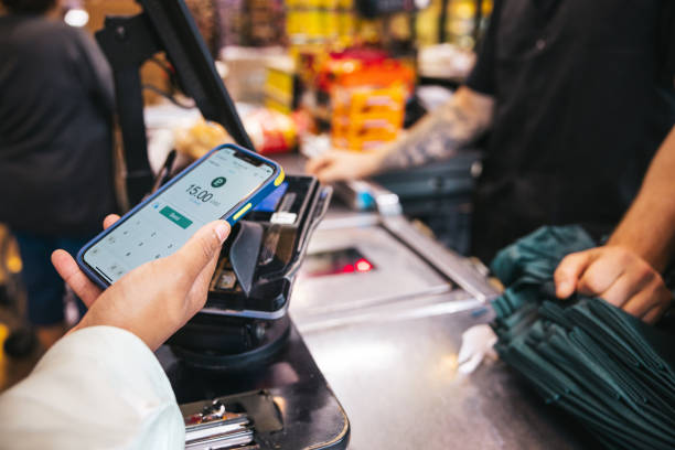 istock Customer paying in a Grocery Store 1937584261