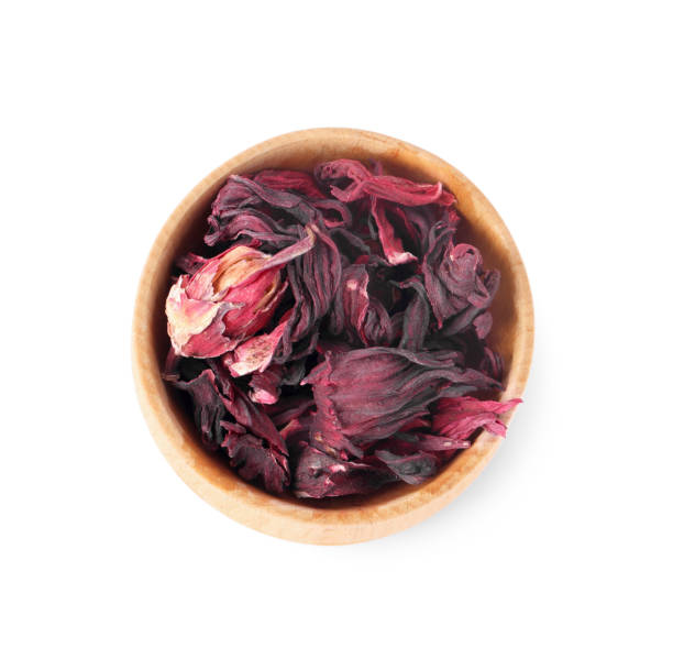 istock Bowl of dry hibiscus tea isolated on white, top view 1937640414