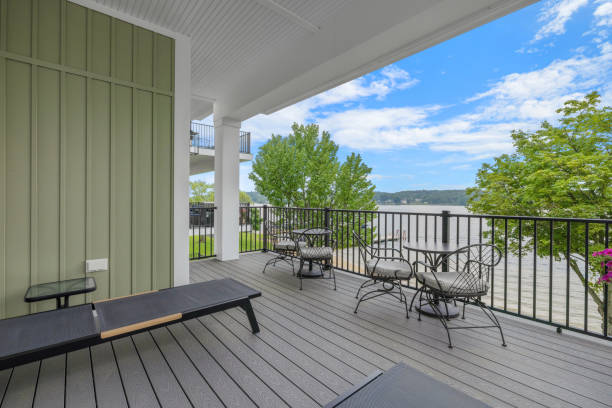 istock an outside balcony with a table and chairs and mountains in the background 1937645190