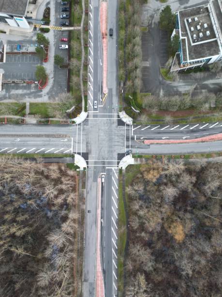 istock aerial view of an intersection with multiple lanes and different buildings 1937652120