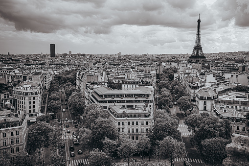 Black and white photo of Paris, France. Aerial view on the Eiffel Tower, Arc de Triomphe, Les Invalides etc.