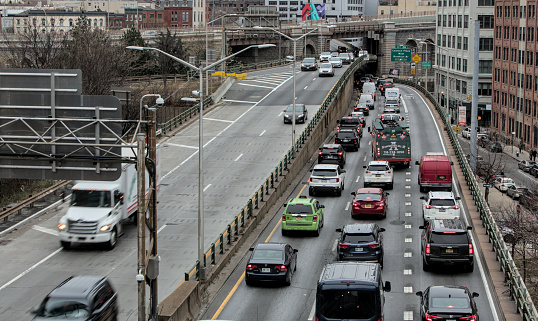 Brooklyn, NY - Jan 15, 2024: Cars on the BQE driving towards Brooklyn Bridge.