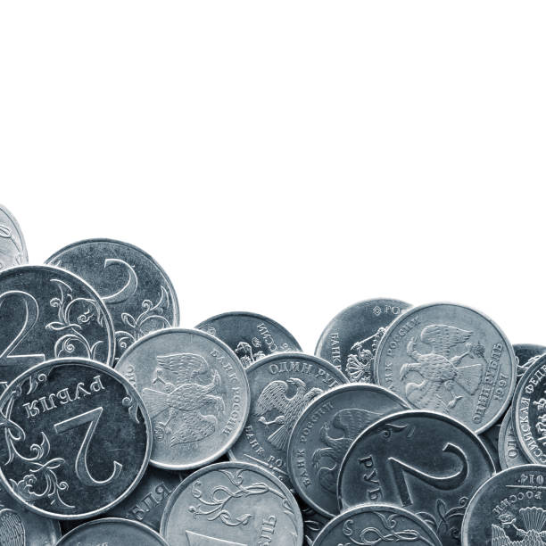 Russian coins rubles in a pile on a white background. View from above.